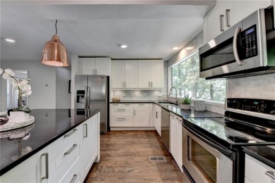 Just listed this beautiful contemporary home on quiet cul-de-sac on Rivermont Golf and Country Club in Georgia - for sale on GolfHomes.com, golf home, golf lot