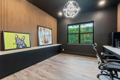 This stunning 5-bed, 6-bath lakefront estate blends modern on Parkland Golf Club in Florida - for sale on GolfHomes.com, golf home, golf lot
