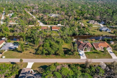 Discover the perfect canvas for your dream home! This waterfront on Sabal Trace Golf and Country Club in Florida - for sale on GolfHomes.com, golf home, golf lot