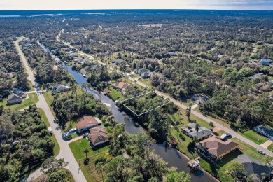Discover the perfect canvas for your dream home! This waterfront on Sabal Trace Golf and Country Club in Florida - for sale on GolfHomes.com, golf home, golf lot