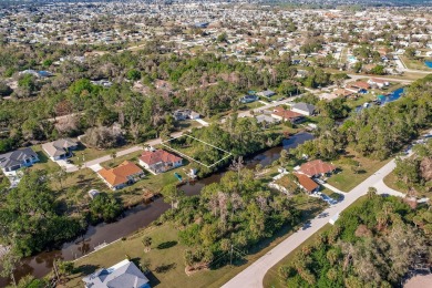 Discover the perfect canvas for your dream home! This waterfront on Sabal Trace Golf and Country Club in Florida - for sale on GolfHomes.com, golf home, golf lot