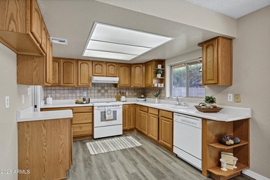 Welcome to 1645 W Nido Ave in Mesa's highly sought-after Dobson on Dobson Ranch Municipal Golf Course in Arizona - for sale on GolfHomes.com, golf home, golf lot