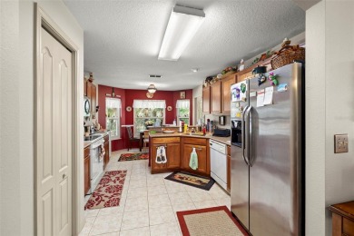 A cozy 3-bedroom home on a private conservation lot at the end on Tampa Bay Golf and Country Club in Florida - for sale on GolfHomes.com, golf home, golf lot