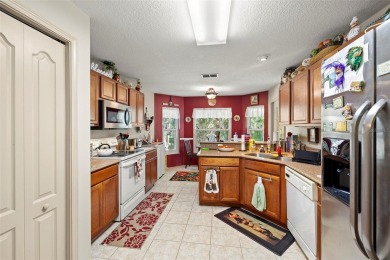 A cozy 3-bedroom home on a private conservation lot at the end on Tampa Bay Golf and Country Club in Florida - for sale on GolfHomes.com, golf home, golf lot