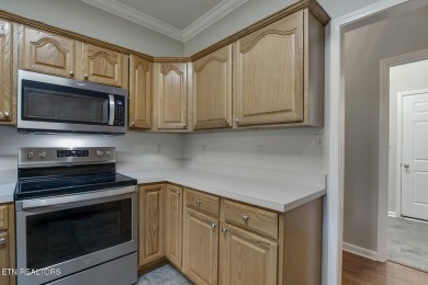 219 Oligi Circle is a charming single-story brick home located on Toqua Golf Course - Loudon County in Tennessee - for sale on GolfHomes.com, golf home, golf lot
