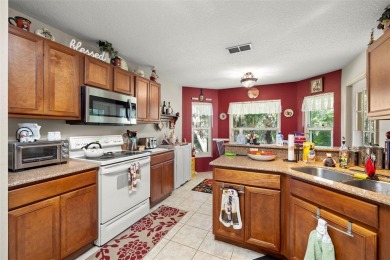 A cozy 3-bedroom home on a private conservation lot at the end on Tampa Bay Golf and Country Club in Florida - for sale on GolfHomes.com, golf home, golf lot
