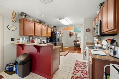 A cozy 3-bedroom home on a private conservation lot at the end on Tampa Bay Golf and Country Club in Florida - for sale on GolfHomes.com, golf home, golf lot