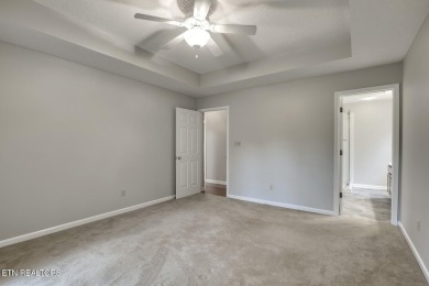 219 Oligi Circle is a charming single-story brick home located on Toqua Golf Course - Loudon County in Tennessee - for sale on GolfHomes.com, golf home, golf lot