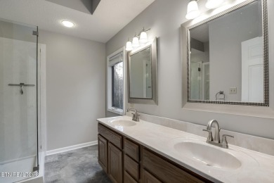 219 Oligi Circle is a charming single-story brick home located on Toqua Golf Course - Loudon County in Tennessee - for sale on GolfHomes.com, golf home, golf lot