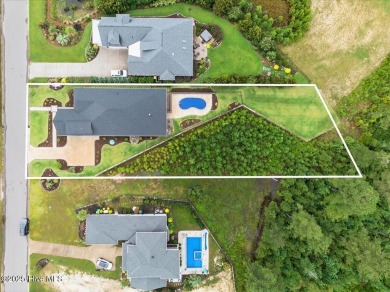 Professional Photos Coming Soon!
Experience coastal luxury at on Compass Pointe Golf Course in North Carolina - for sale on GolfHomes.com, golf home, golf lot