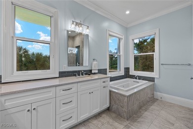 Experience island living at its finest with this stunning on The Sanctuary Golf Club in Florida - for sale on GolfHomes.com, golf home, golf lot