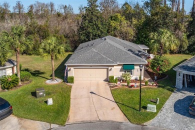 A cozy 3-bedroom home on a private conservation lot at the end on Tampa Bay Golf and Country Club in Florida - for sale on GolfHomes.com, golf home, golf lot