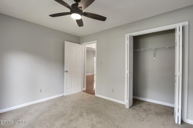 219 Oligi Circle is a charming single-story brick home located on Toqua Golf Course - Loudon County in Tennessee - for sale on GolfHomes.com, golf home, golf lot