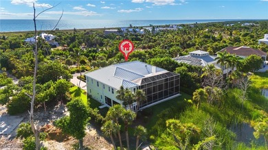 Experience island living at its finest with this stunning on The Sanctuary Golf Club in Florida - for sale on GolfHomes.com, golf home, golf lot