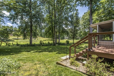 219 Oligi Circle is a charming single-story brick home located on Toqua Golf Course - Loudon County in Tennessee - for sale on GolfHomes.com, golf home, golf lot