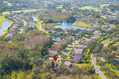 A cozy 3-bedroom home on a private conservation lot at the end on Tampa Bay Golf and Country Club in Florida - for sale on GolfHomes.com, golf home, golf lot