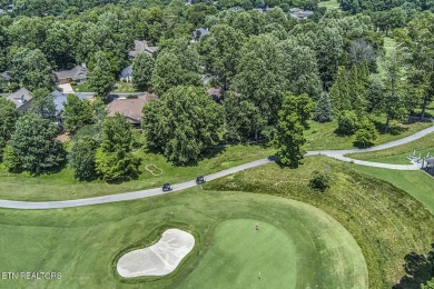 219 Oligi Circle is a charming single-story brick home located on Toqua Golf Course - Loudon County in Tennessee - for sale on GolfHomes.com, golf home, golf lot