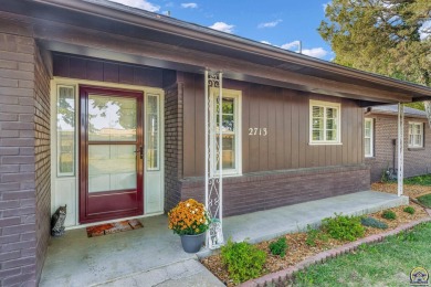 Come fall in love with this well maintained ranch-style home! on Topeka Country Club in Kansas - for sale on GolfHomes.com, golf home, golf lot