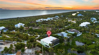 Experience island living at its finest with this stunning on The Sanctuary Golf Club in Florida - for sale on GolfHomes.com, golf home, golf lot