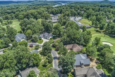 219 Oligi Circle is a charming single-story brick home located on Toqua Golf Course - Loudon County in Tennessee - for sale on GolfHomes.com, golf home, golf lot
