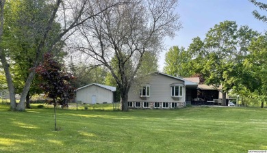 This stunning 3.7-acre in-town acreage offers the perfect blend on Oak Hills Golf Course in Iowa - for sale on GolfHomes.com, golf home, golf lot