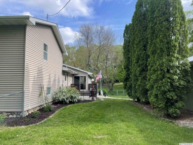 This stunning 3.7-acre in-town acreage offers the perfect blend on Oak Hills Golf Course in Iowa - for sale on GolfHomes.com, golf home, golf lot