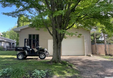 This stunning 3.7-acre in-town acreage offers the perfect blend on Oak Hills Golf Course in Iowa - for sale on GolfHomes.com, golf home, golf lot