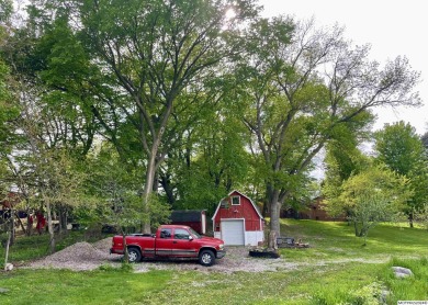 This stunning 3.7-acre in-town acreage offers the perfect blend on Oak Hills Golf Course in Iowa - for sale on GolfHomes.com, golf home, golf lot