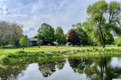 This stunning 3.7-acre in-town acreage offers the perfect blend on Oak Hills Golf Course in Iowa - for sale on GolfHomes.com, golf home, golf lot