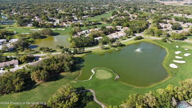 Spectacular view overlooking the GOLF COURSE, located between on Timber Pines Golf Course in Florida - for sale on GolfHomes.com, golf home, golf lot