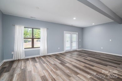 This spacious 1 floor townhouse offers the perfect blend of on  in North Carolina - for sale on GolfHomes.com, golf home, golf lot
