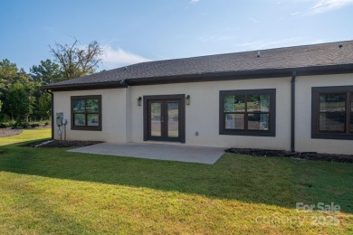 This spacious 1 floor townhouse offers the perfect blend of on  in North Carolina - for sale on GolfHomes.com, golf home, golf lot