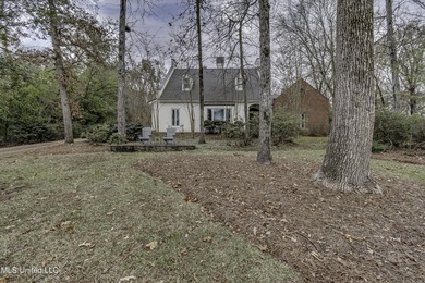 Experience timeless Southern charm blended beautifully with on Annandale Golf Club in Mississippi - for sale on GolfHomes.com, golf home, golf lot