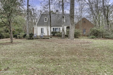 Experience timeless Southern charm blended beautifully with on Annandale Golf Club in Mississippi - for sale on GolfHomes.com, golf home, golf lot