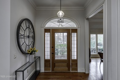 Experience timeless Southern charm blended beautifully with on Annandale Golf Club in Mississippi - for sale on GolfHomes.com, golf home, golf lot