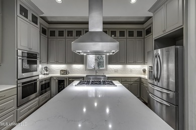 Experience timeless Southern charm blended beautifully with on Annandale Golf Club in Mississippi - for sale on GolfHomes.com, golf home, golf lot