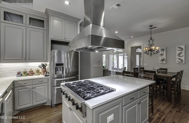 Experience timeless Southern charm blended beautifully with on Annandale Golf Club in Mississippi - for sale on GolfHomes.com, golf home, golf lot