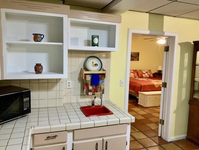 Expansive Custom built multi-level lakefront residence located on El Valle Escondido Golf Course in New Mexico - for sale on GolfHomes.com, golf home, golf lot