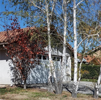 Located in a quiet, sought-after neighborhood, this property on River Oaks Golf Course in California - for sale on GolfHomes.com, golf home, golf lot