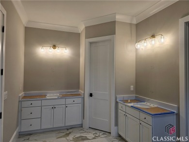 The Lanier floorplan offers a delightful blend of elegance and on The Georgia Club in Georgia - for sale on GolfHomes.com, golf home, golf lot