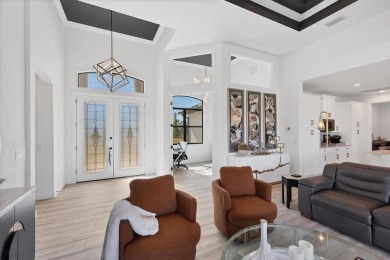 This exquisite, nearly brand-new DM Dean home is nestled on a on Rotonda Golf and Country Club The Links Course in Florida - for sale on GolfHomes.com, golf home, golf lot