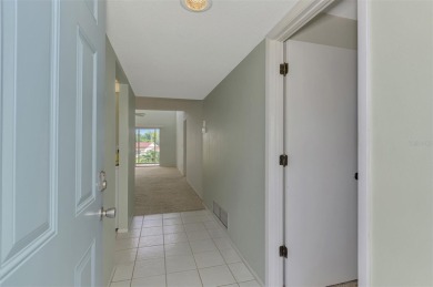 Attractive two bedroom, two bath, second floor condo, in the on Capri Isle Golf Club in Florida - for sale on GolfHomes.com, golf home, golf lot