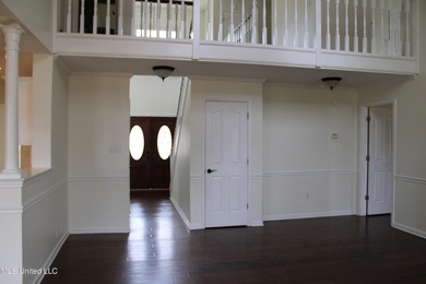 Nestled in the prestigious Plantation Subdivision, this stunning on The Plantation Golf Club in Mississippi - for sale on GolfHomes.com, golf home, golf lot