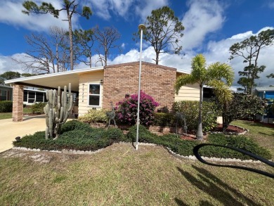 Discover this open-concept 2-bedroom, 2-bath home in the gated on Lake Fairways Country Club in Florida - for sale on GolfHomes.com, golf home, golf lot