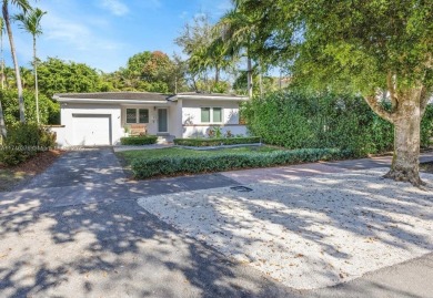 Nestled in the desirable streets of North Gables, this charming on Granada Golf Club in Florida - for sale on GolfHomes.com, golf home, golf lot