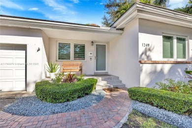 Nestled in the desirable streets of North Gables, this charming on Granada Golf Club in Florida - for sale on GolfHomes.com, golf home, golf lot