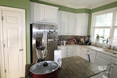 this elegant open home on the beautiful golf course in the on Peninsula Golf and Racquet Club in Alabama - for sale on GolfHomes.com, golf home, golf lot