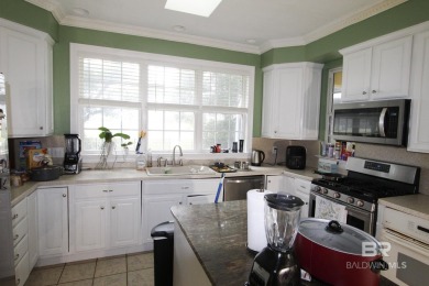 this elegant open home on the beautiful golf course in the on Peninsula Golf and Racquet Club in Alabama - for sale on GolfHomes.com, golf home, golf lot