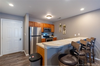 Turn-key, fully furnished and beautifully updated-this oversized on Osage National Golf Club in Missouri - for sale on GolfHomes.com, golf home, golf lot