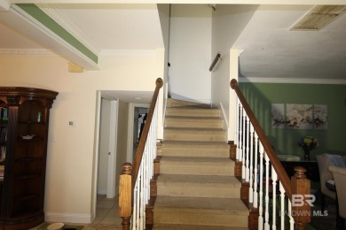 this elegant open home on the beautiful golf course in the on Peninsula Golf and Racquet Club in Alabama - for sale on GolfHomes.com, golf home, golf lot